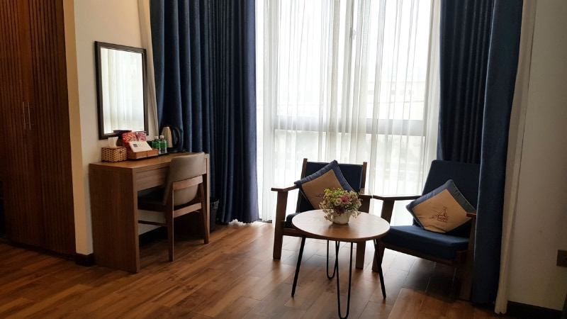 Sitting area of the hotel room at the Animor Green Home Villa Da Nang